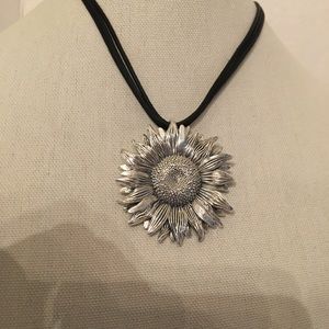 Sterling Silver Sunflower Pendant on Leather Cord.